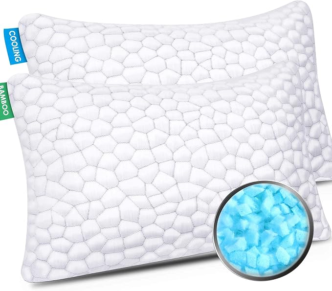 Two Cooling Bed Pillows in blue and white colors are displayed together on a bed.