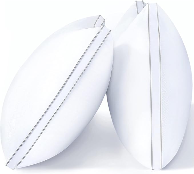 Two white pillows with white stripes on each side, showcasing the soft design of View Star down Pillows.